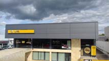 Concesionario Opel en Elvas (Portugal).<br>Revestimiento de fachada. Fachada panel sándwich