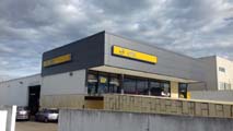 Concesionario Opel en Elvas (Portugal).<br>Revestimiento de fachada. Fachada panel sándwich