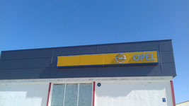 Fachada concesionario Opel en Mahon (Baleares).<br> Revestimiento Fachada. Fachada Panel Sandwich