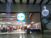 Supermercado Lidl en centro comercial Isla Azul de Madrid.<br>Revestimiento de Fachadas. Fachada Panel Composite