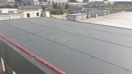 Almacén regulador Lidl en Alcalá de Henares.<br>Envolvente de marquesina. Placa laminada de alta presión