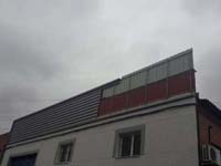 Fachada nave industrial Fuenlabrada (Madrid).<br> Revestimiento de fachadas. Fachada de chapa de acero prelacada.