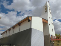 Cubierta de zinc sobre panel de madera.<br>Iglesia en Tarancón (Cuenca)
