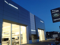 Concesionario Jaguar Land Rover en Móstoles (Madrid)<br>Revestimiento de fachadas. Fachada panel composite de aluminio.