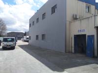 Nave industrial en Coslada (Madrid).<br>Revestimiento de fachadas. Fachada de chapa perfilada tipo minionda