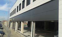 Concesionario Opel en Sant Boi de Llobregat (Barcelona)<br>Fachada panel sándwich. Panel sándwich de fachada