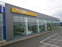 Concesionario Opel en Avilés (Asturias)<br>Revestimiento de fachadas. Fachada de panel sándwich