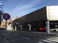 Concesionario Opel en Manresa (Barcelona)<br>Revestimiento de fachada panel sándwich
