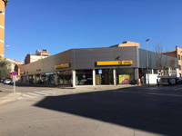 Concesionario Opel en Manresa (Barcelona)<br>Revestimiento de fachada panel sándwich