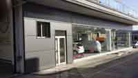 Fachada panel sandwich.<br>Concesionario Opel en Mijas (Málaga)