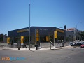 Fachada panel sandwich.<br>Concesionario Opel Mostoles (Madrid)