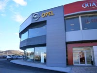 Concesionario Opel en Zaratán (Valladolid)<br>Revestimiento de fachadas. Fachada de panel sándwich