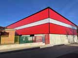 Pabellón deportivo en Rielves (Toledo).<br> Cubrición y cerramiento de edificios. Panel sándwich metálico