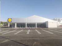 Supermercado Lidl en Valdepeñas (Ciudad Real). <br>Revestimiento de fachada. Fachada panel composite de aluminio