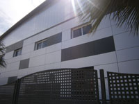 Industria alimentaria en Totana (Murcia)<br>Revestimiento de fachadas. Panel sandwich, policarbonato, panel composite de aluminio