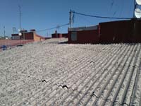 Vivienda en calle Socuéllamos de Madrid.<br>Sustitución de Cubierta de Fibrocemento. Cubierta Panel Sandwich Metálico